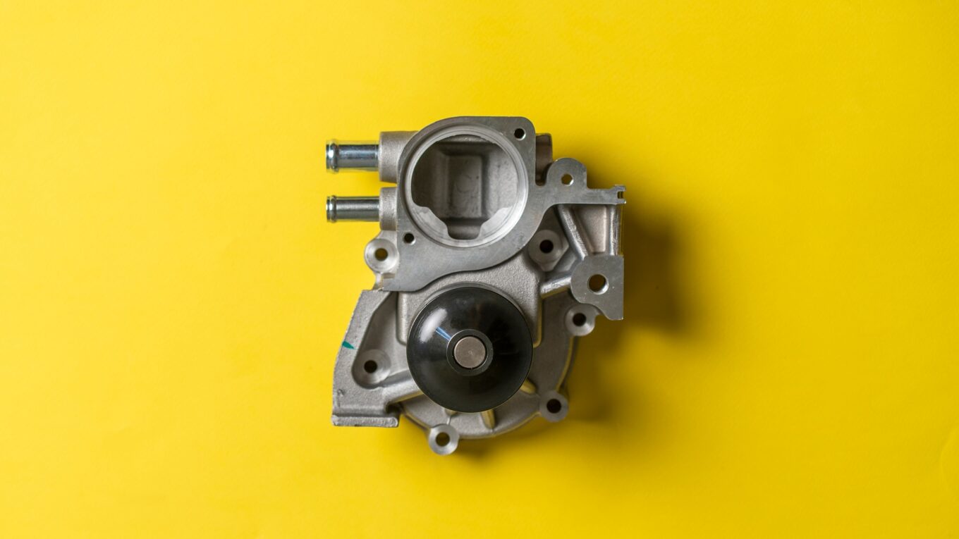 a brand new car engine water pump motor isolated