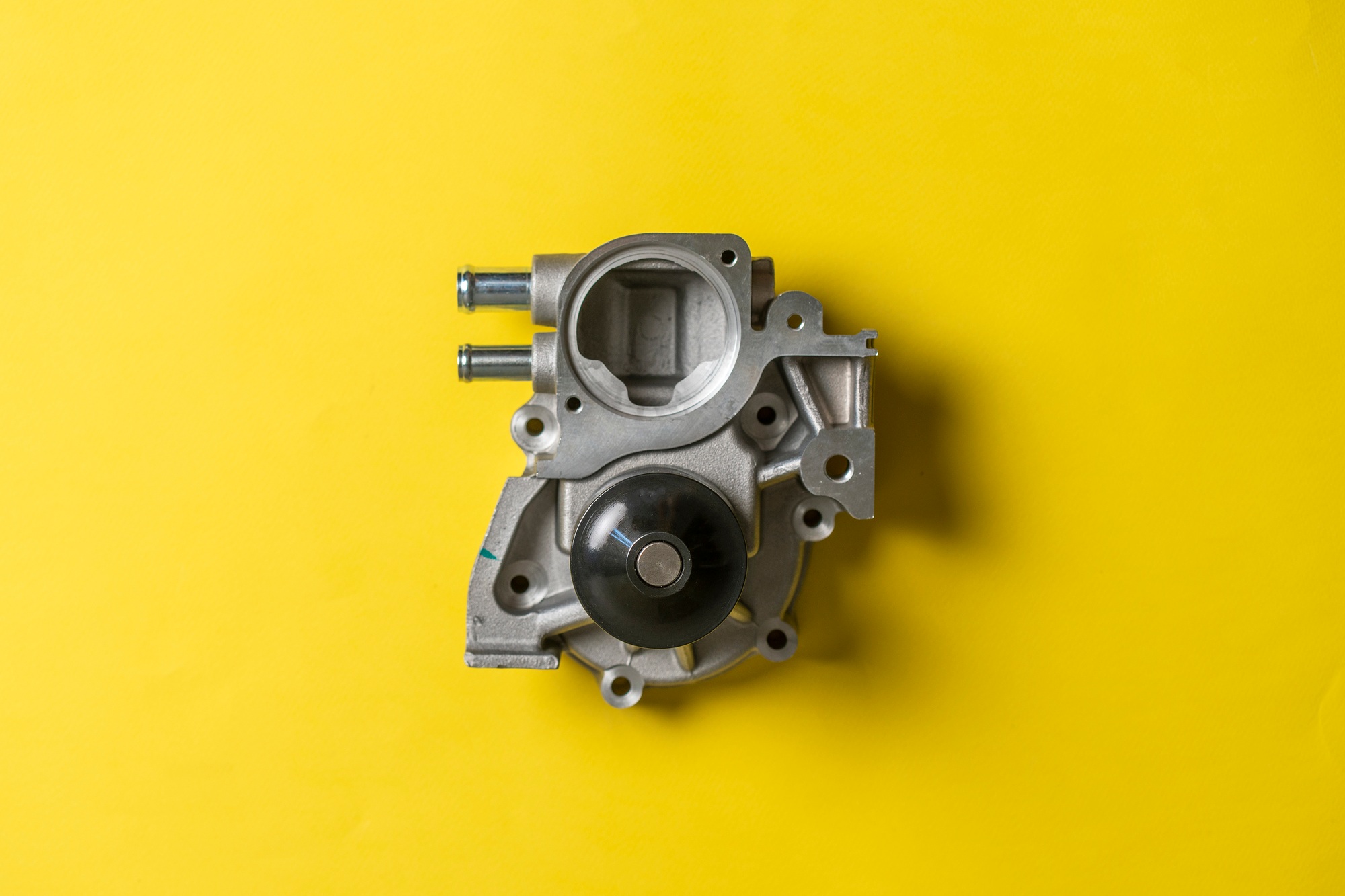 a brand new car engine water pump motor isolated